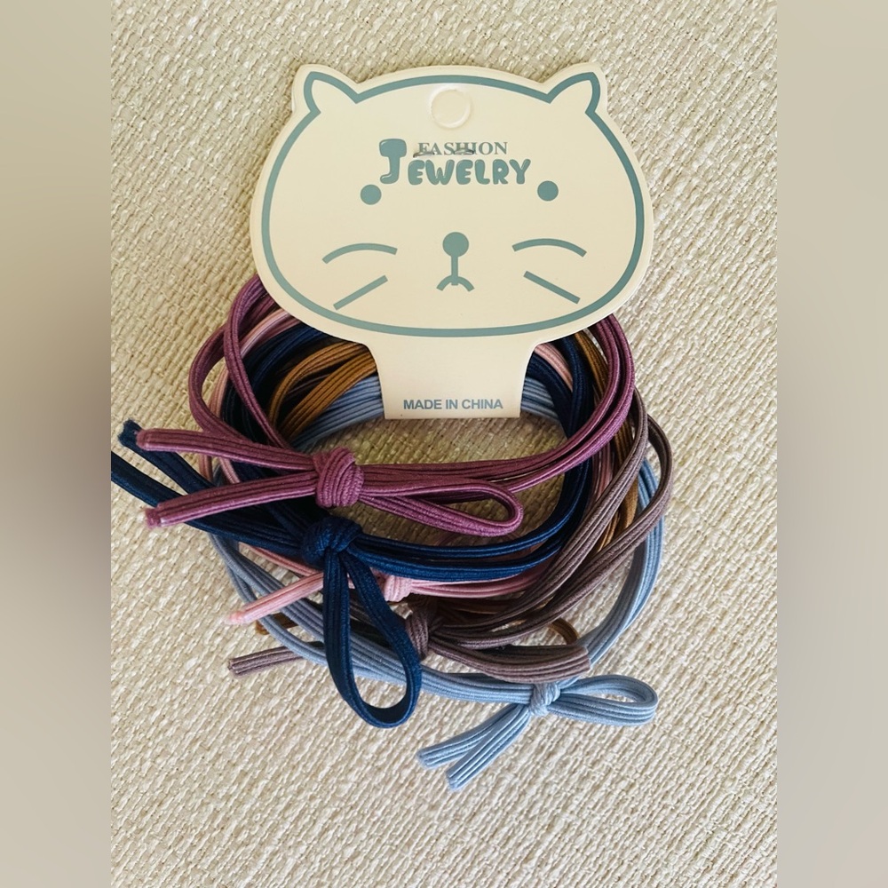New Hair Ties or Bracelets. Multiple colors. 6 total pieces.